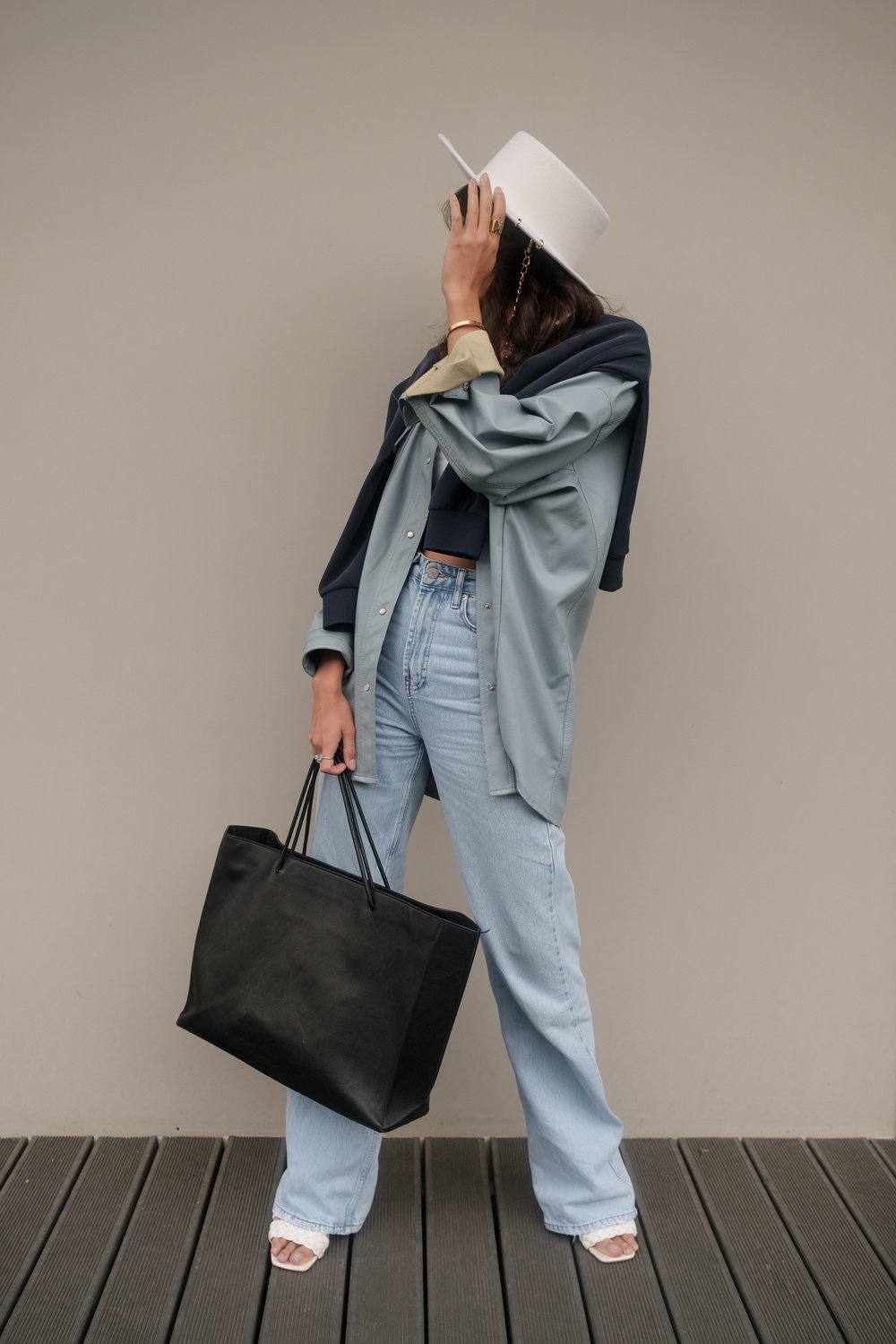 Fashionable Woman Holding a Big Bag 